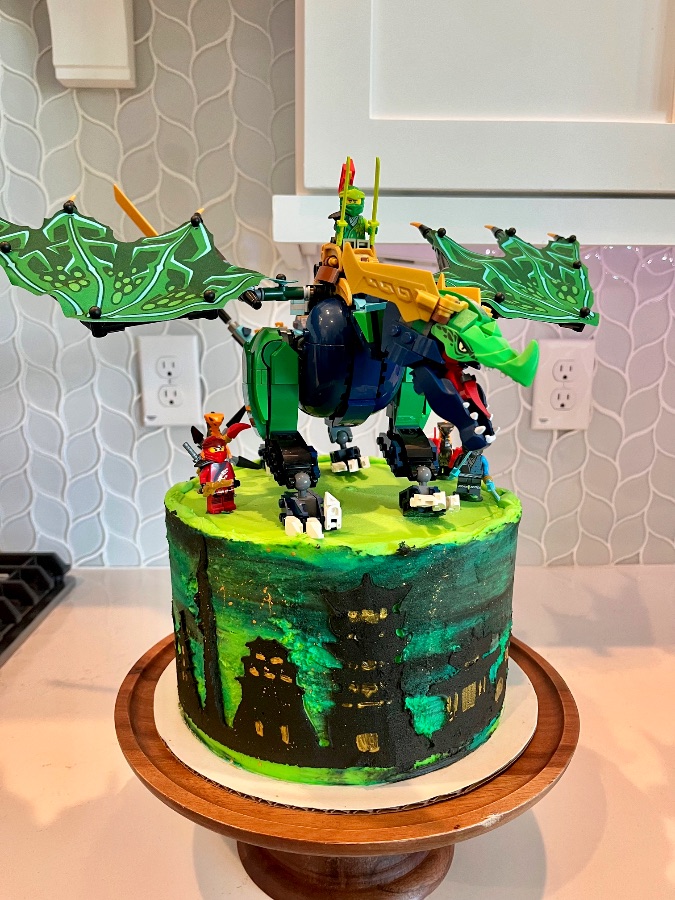 Bright green key lime cake with a fault-line reveal of candied lime slices